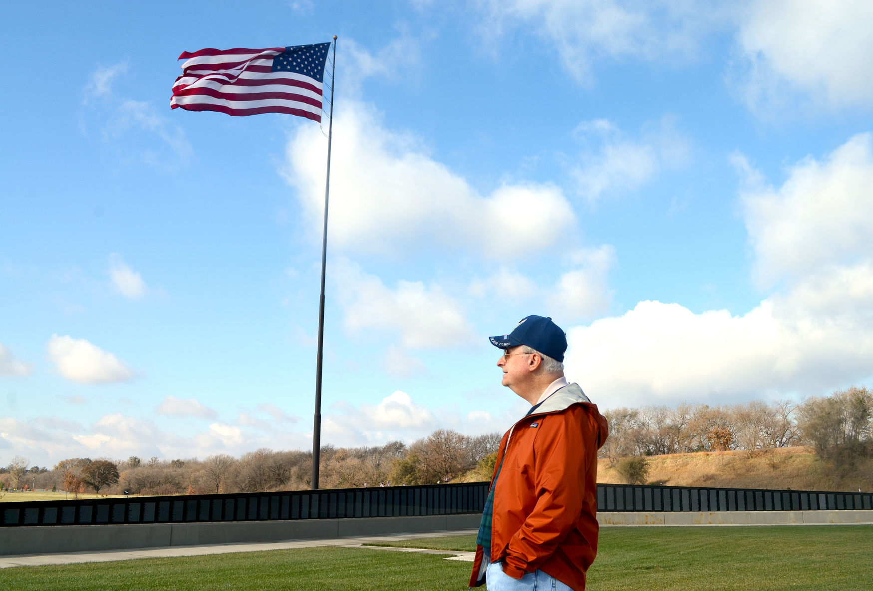 Mike Newhouse by big American flag